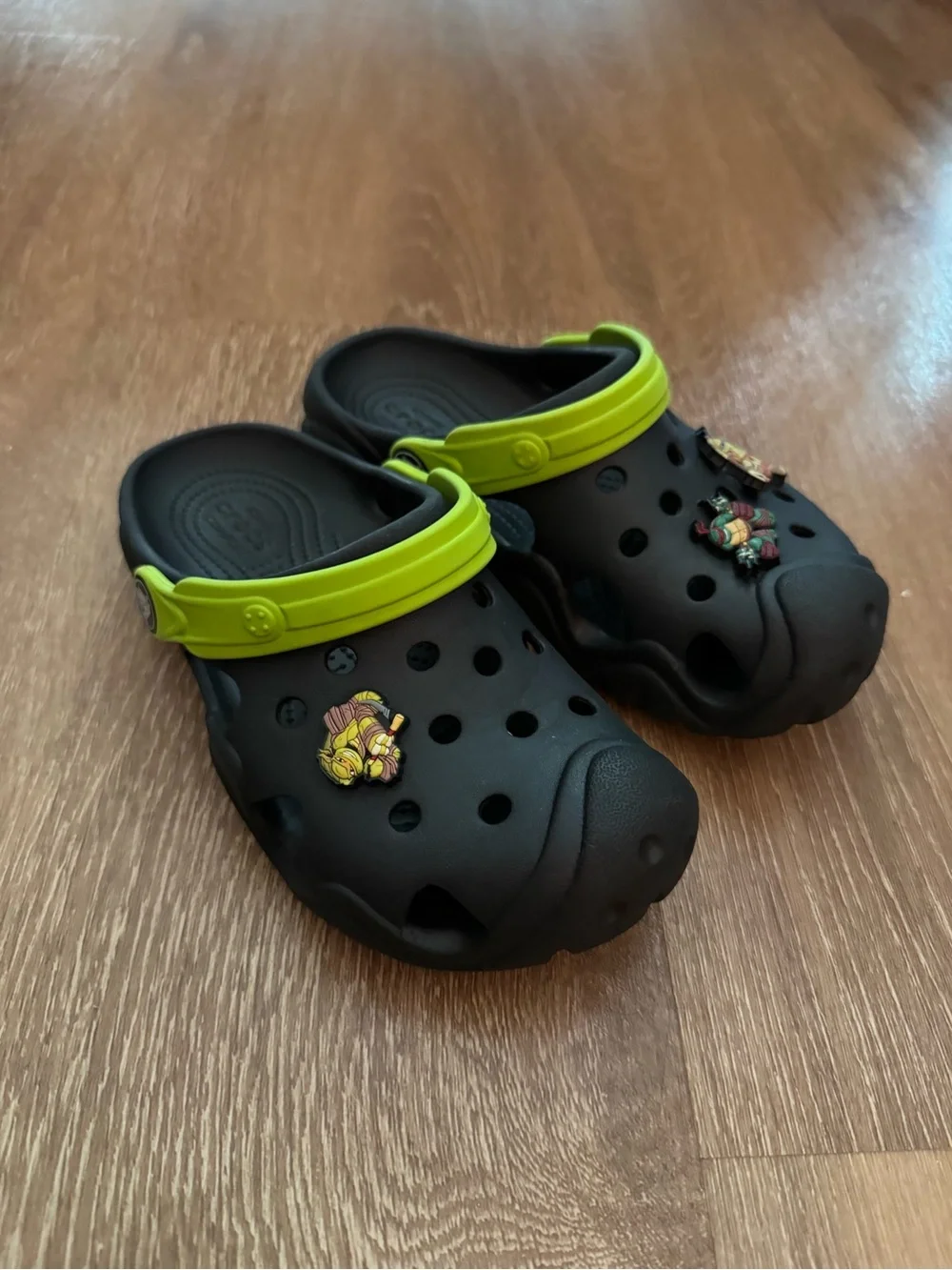 CROCS Kids Black Clogs with Lime Green Heel Strap